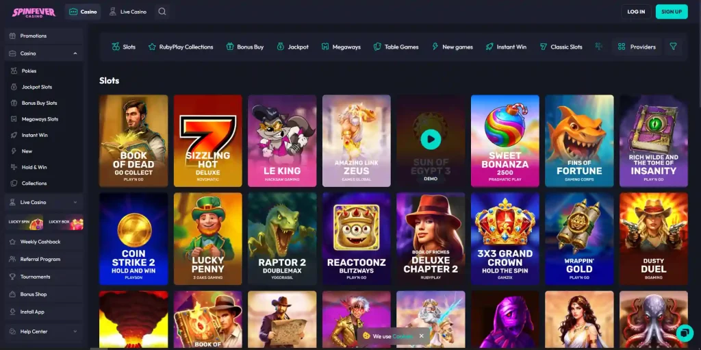 Current SpinFever games lobby showing pokies categories and provider navigation